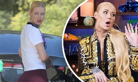 Plastic Surgeon Claims Iggy Azalea S Bum Implants May Have Leaked Daily Mail Online