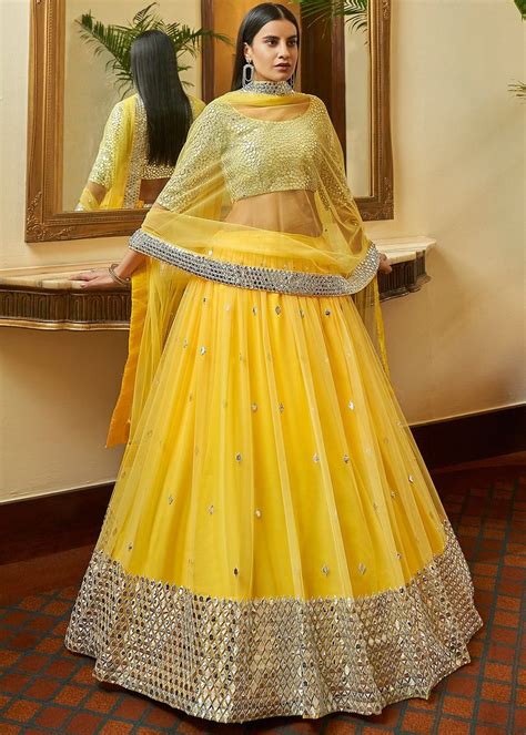 Exclusive Yellow Color Lehenga Choli In Net Fabric With Embroidery Work