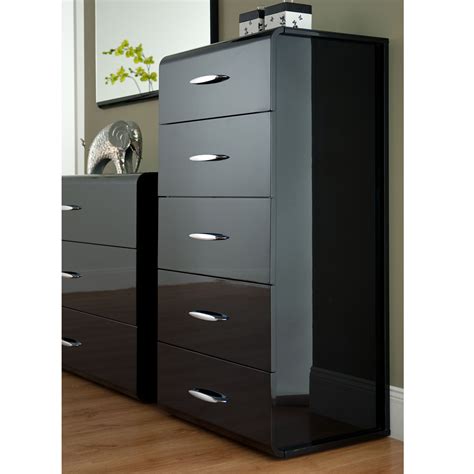 This white tall dresser will renew the look of a modern bedroom, especially when paired up with the white bedside table and a low dresser of the same designer. Black Tall Dresser Ideas that Will Improve Your Interior ...