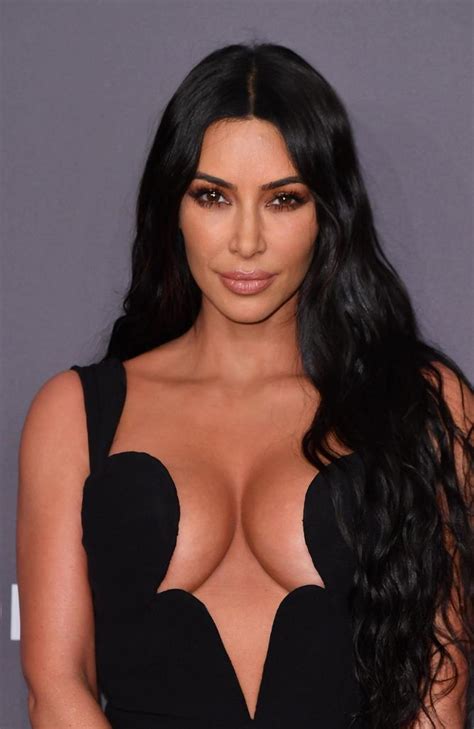 kim kardashian flashes insane cleavage with kourtney kardashian at amfar gala in new york perthnow