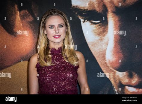 Kimberley Garner Poses For Photographers Upon Arrival At The Premiere Of The Film Jack Reacher
