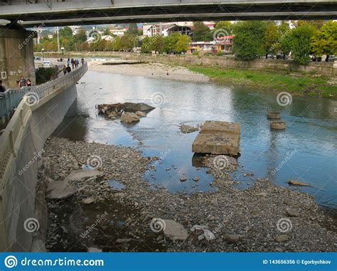 Sochi River With Small Water And Waterfall At Sunny Day Stock Photo