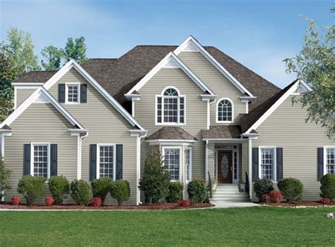 Look at how well gentek's windswept smoke siding looks along with our distinction faux wood cladding and stone exterior. Gentek Vinyl Siding