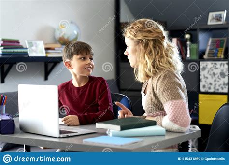 Boy Gladly Doing His Homework With His Mother Stock Image Image Of