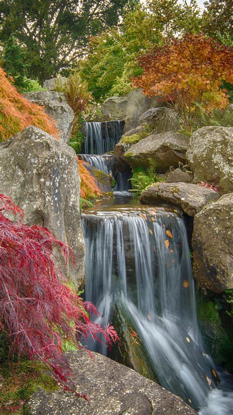 Download Wallpaper 2160x3840 Waterfall Stones Cascade Nature Samsung