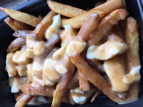 Poutine is a canadian dish of french fries and fresh cheese curds, covered with brown gravy or sauce. The 10: Wine About Winter, WNED Kids Fest, Poutine Eating Contest - The Buffalo News
