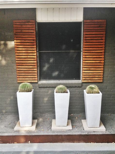 This kind of exterior is perfect for those who are found of greenery and are willing to have a different kind of garden and at the same time this would also make the exterior look so beautiful that you can notice people pausing there for a while to click. modern exterior window shutters - Google Search | awnings ...