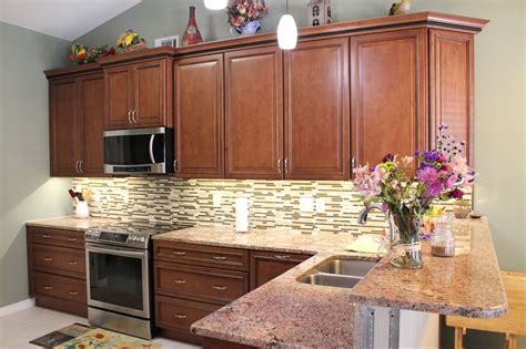 Gas lift pedestal and fixed height stools with legs, no matter what you are looking for we are bound to have a bar stool to fulfill your needs. Fabuwood Wellington Cinnamon, under cabinet lighting, breakfast bar | Under cabinet lighting ...