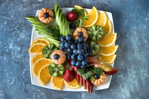 Fruit Plate Glass Bank Of Lemonade With Sliced Citrus Fruits On A