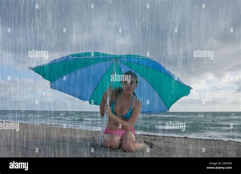 Woman On The Beach In A Rainy Day Florida United States Of America North America Stock Photo
