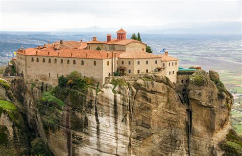 Most villagers spend their days relaxing at the cafes under the grape vines. Monastery of Agios Stefanos at Meteora - GTP