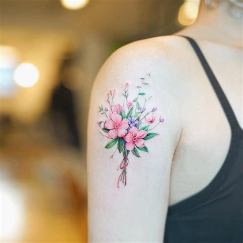 Perfect Color Tattoo Of Mini Bouquet Motive Done By Tattoo Artist Nando Tattooer Bouquet