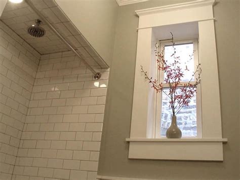 Attach the molding to the head casing. Making my bathroom window look more substantial with ...