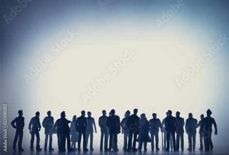 Group Of People Walking Towards The White Light Buy This Stock Photo