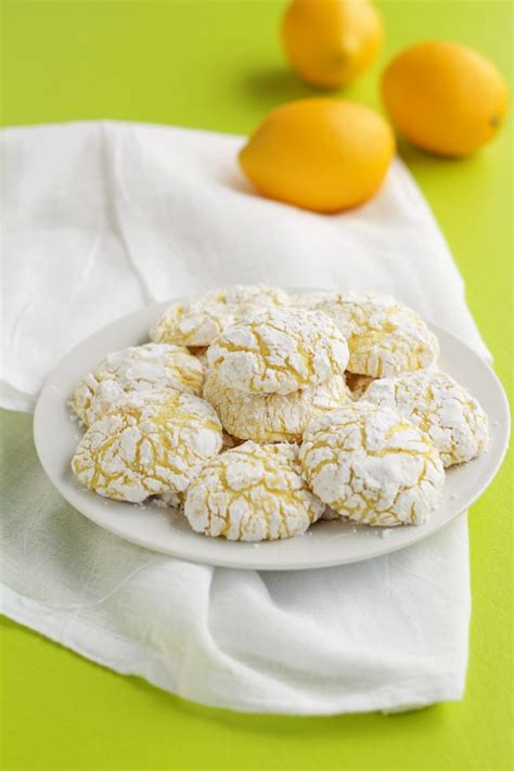 Add in the lemon zest, honey, and optional food coloring, followed by the dry ingredients. Lemon Crinkle Cookies Recipe | The Bearfoot Baker