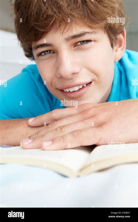 Teenage Boy Reading A Book Stock Photo Alamy