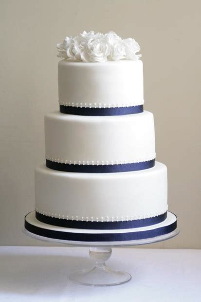 Get $5 designer coupon packs. Simple but elegant 3 tier wedding cake for Vicky and Tom ...