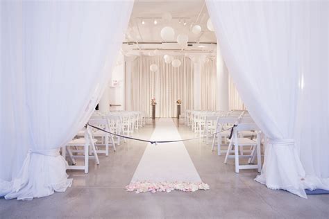 All White Wedding Ceremony With Contemporary Decor Including White
