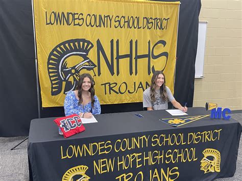 Trojans Glidewell and Vickers sign with college cheerleading programs
