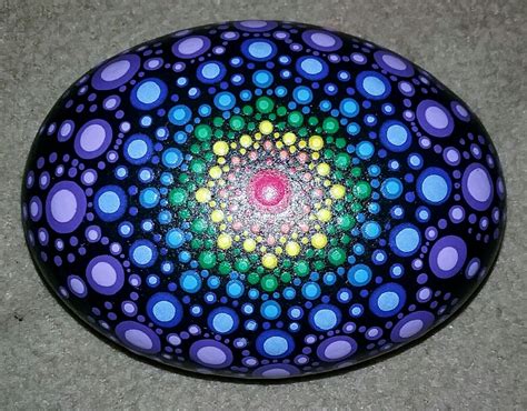 Set the mood for love by painting rocks with heart mandala designs. My latest mandala | Mandala painted rocks, Rock painting ...
