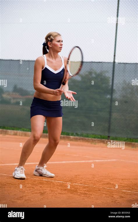 Young Blond Caucasian Girl Playing Tennis Stock Photo Alamy