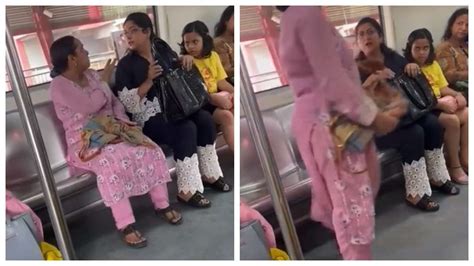 Watch Two Women Engage In Heated Argument Inside Delhi Metro Video
