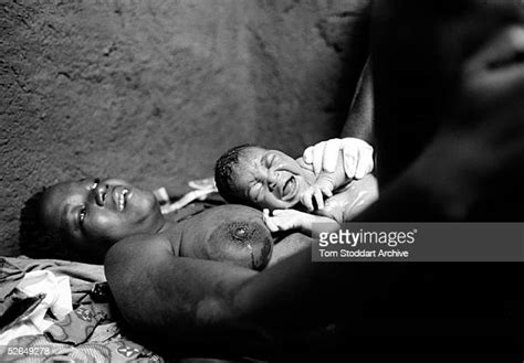 black woman giving birth photos and premium high res pictures getty images