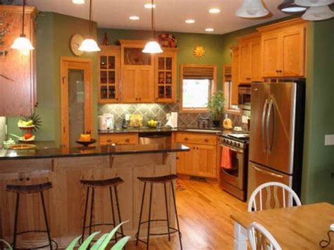 When you are trying to pick a wall color to update the look of honey oak cabinets, what you want to do is to downplay the 'honey', the yellow tone of the cabinets. Kitchen Paint Colors with OAK Cabinets - Home Furniture Design