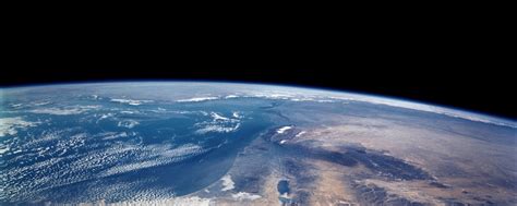 Follow us for regular updates on awesome new wallpapers! Earth From Space Dual Monitor Wallpaper | MyConfinedSpace