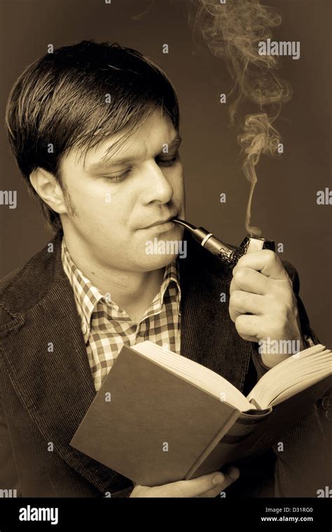 Portrait Of A Man Reading And Smoking A Pipe Close Up Stock Photo Alamy
