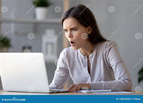 Shocked Stressed Woman Looking At Laptop Reading Negative Surprise