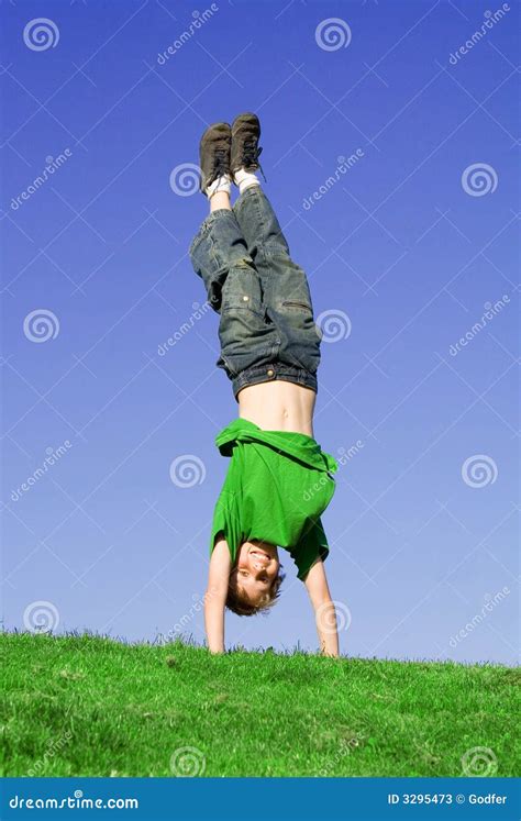 Happy Child Playing Handstand Stock Photos Image 3295473