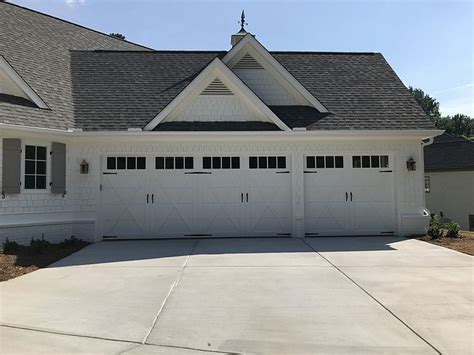 Modern garages aren't just for cars and dusty forgotten storage boxes anymore, but have become an extension of the home. Garage Lighting Garage Lighting Ideas Quoizel Aged Copper Chalmers 1 Light 16" Tall Outdo… (With ...