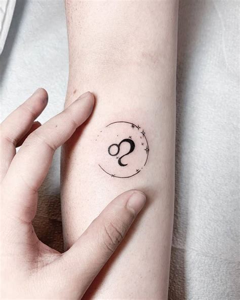 Cancer zodiac symbol temporary tattoo (set of 3) littletattoos. Leo Zodiac symbol tattoo on the inner forearm.