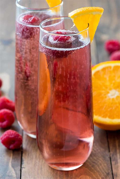 Christmas cocktail & drink recipes. 5-minute Pink Champagne Punch Cocktail - Crazy for Crust