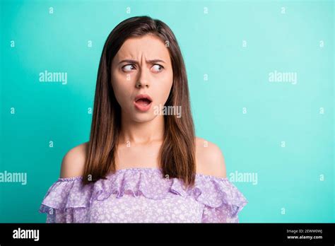 Portrait Of Impressed Stressed Girl Look Empty Space Open Mouth Wear Purple Shirt Isolated On