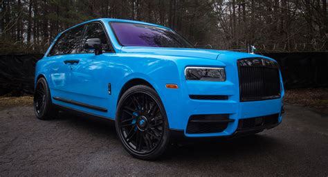 We parked it in front of a thrift store. Celeb-Owned Rolls-Royce Cullinan Gets Flashy Wrap, 24-Inch ...