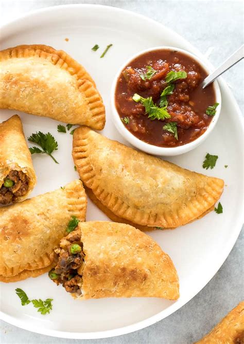 Tender Flakey Empanadas Loaded With Ground Beef Potatoes Peas And