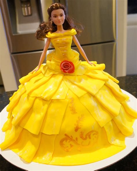 Making a princess doll cake isn't as hard as you'd think it is to make. Belle doll cake | Princess belle cake, Disney princess ...