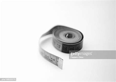 Measuring Tape Black And White Photos And Premium High Res Pictures