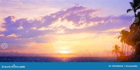 Art Beautiful Sunrise Over The Sea On The Beach Of A Tropical Island