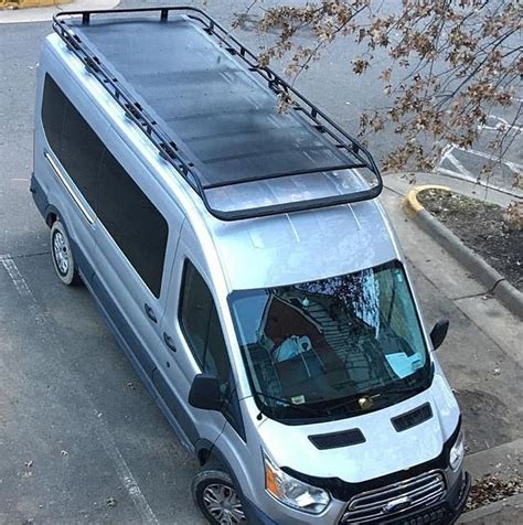 Aluminess Roof Rack On A Ford Transit Adds Extra Platform For Hanging