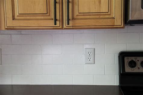 Whether they are flooring, a countertop, or a backsplash, their color isn't always quite right. How to Paint a Tile Backsplash - Bright Green Door