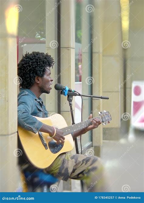 Man Playing Guitar In The Street Musician On The Street Editorial