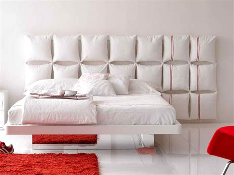 Dan faires canvas headboard with nail head trim 10. 25 Gorgeous DIY Headboard Projects