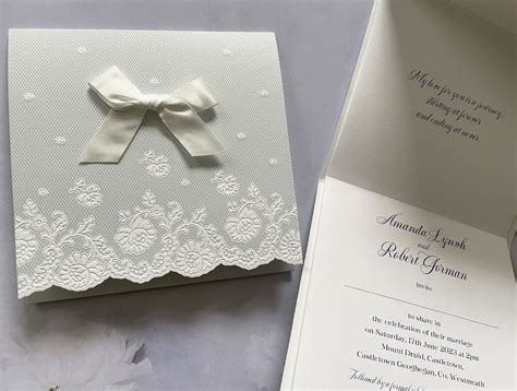 Baby Blue Invitation With Floral Embossments