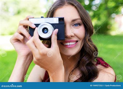 Happy Woman With Camera Photographing At Park Stock Photo Image Of