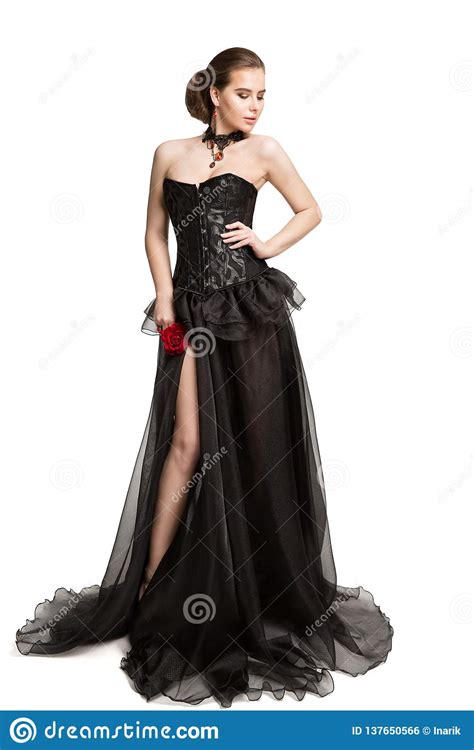Fashion Model In Black Corset Dress Holding Red Rose Flower Beautiful