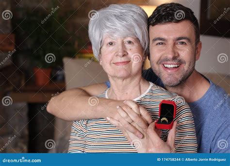 Couple With Age Difference Getting Engaged Stock Photo Image Of Happy