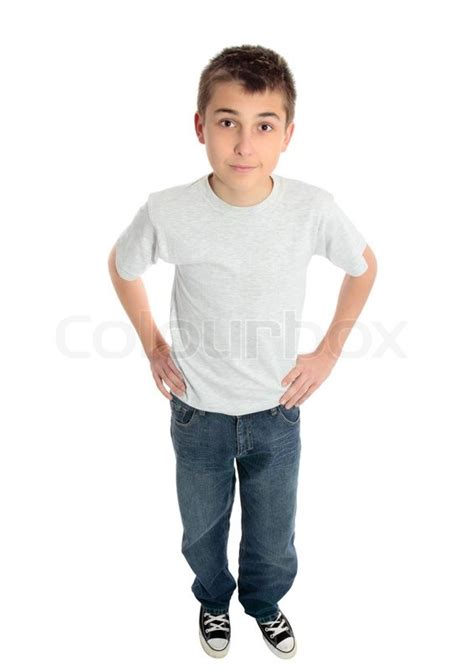 A pre teen child standing with hands on | Stock image | Colourbox